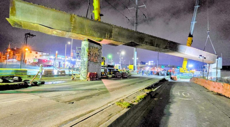 Trabajadores de Cundinamarca trabajando de madrugada en las vías de Soacha.